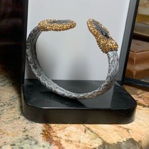 Hamsa adjustable bracelet. Strongly set stones.